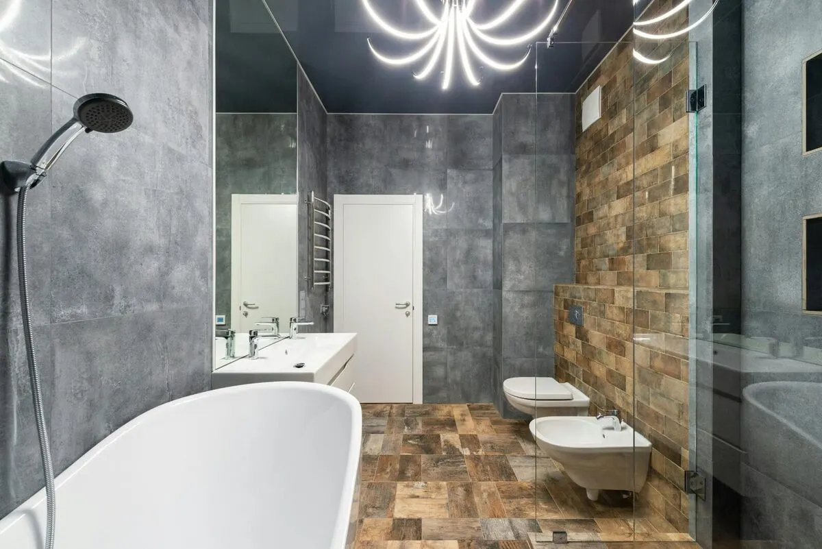 Designer bathroom with double vanity and walk-in shower